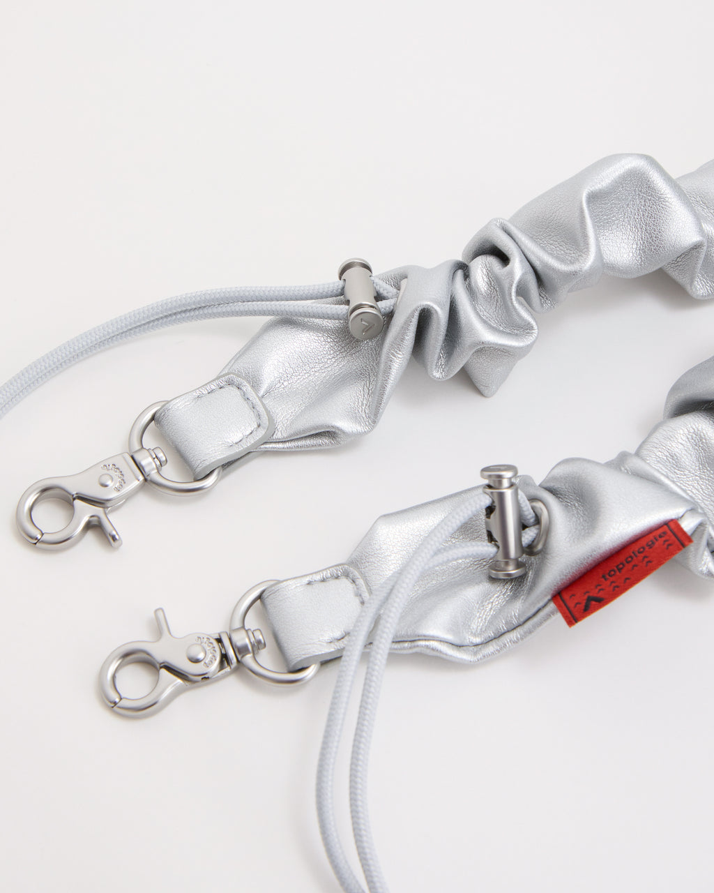 Topologie Chrome Bottle Bungee Strap